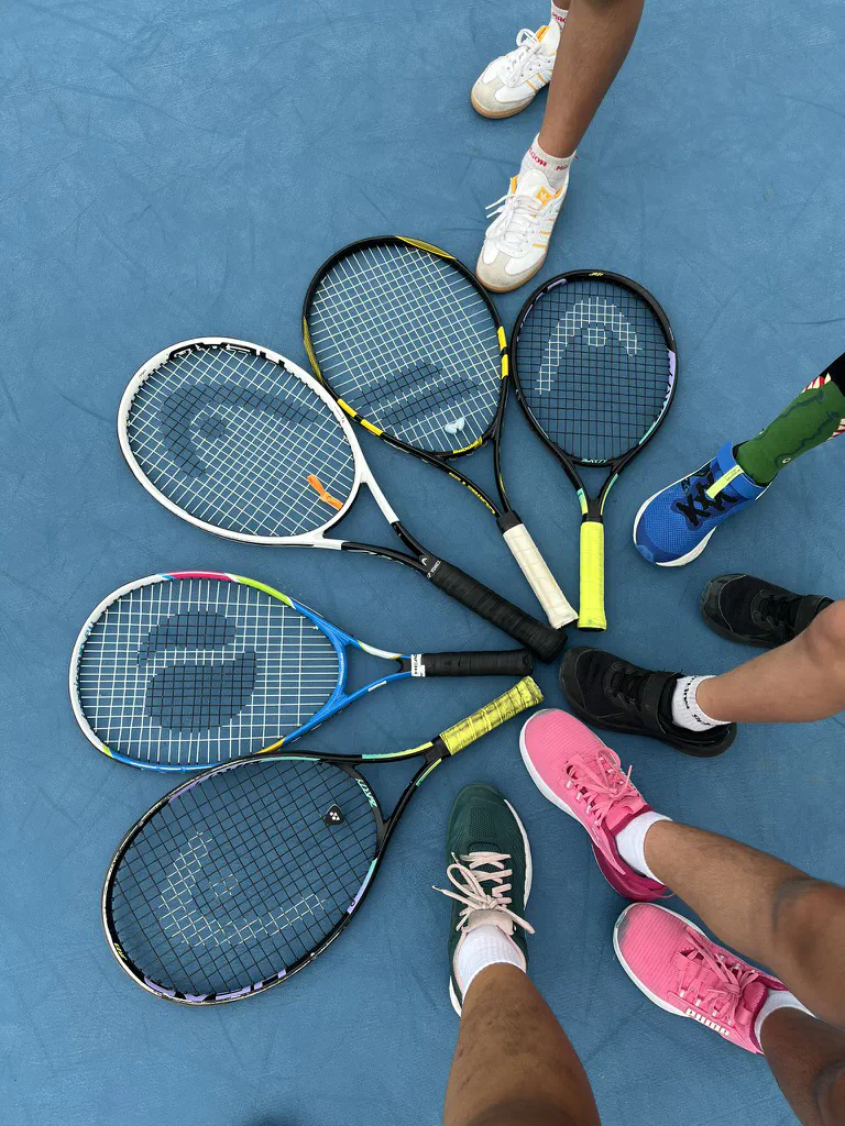 /images/coaching/racquet-flower.jpeg